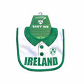 Lansdowne Sports Ireland Rugby Style Baby Bib One Size – front view – white cotton bib with green trim, printed collar, and shamrock crest.