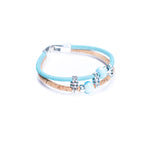 Meninas Bonitas Cork Colourful Ceramic Bead Handmade Bracelet 18x1cm – detail – light blue cork bracelet featuring two light blue marbled ceramic beads, front view.